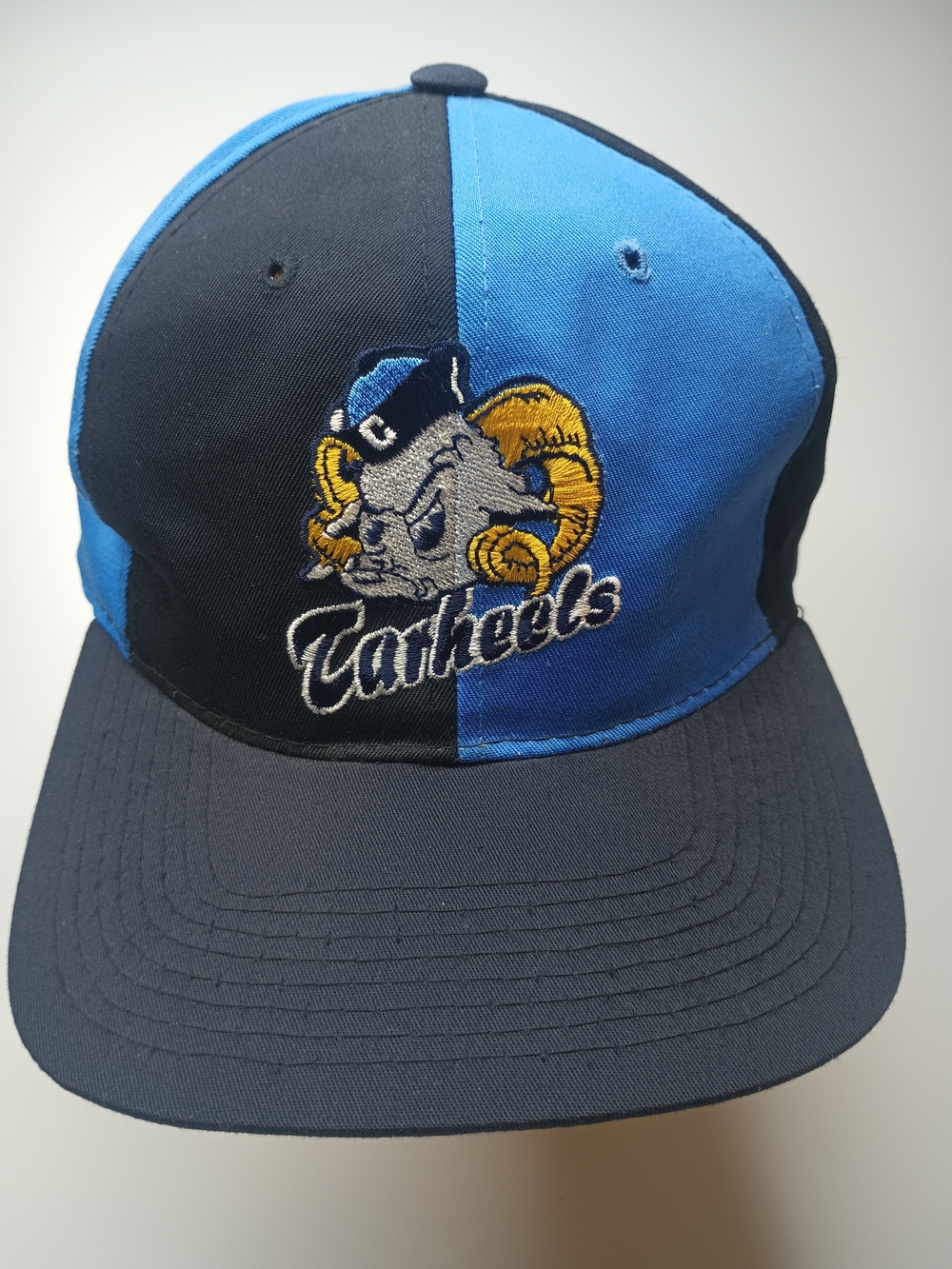 Vintage STARTER 90s UNC North Carolina Tar Heels Starter Pinwheel Snapback Hat.